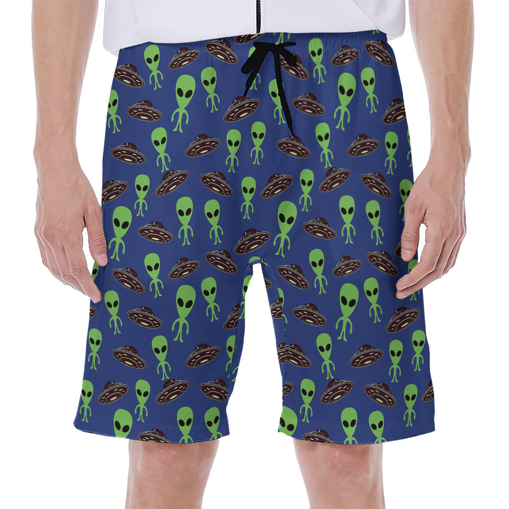 Alien Invasion: Hawaiian Men's Beach Shorts with Green UFO Print - 1